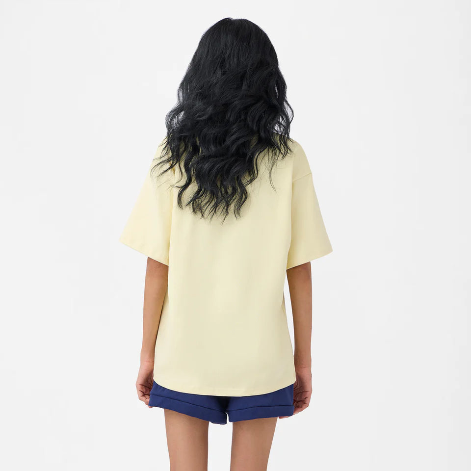 Lion Crest Raquette Tee in Pastel Yellow